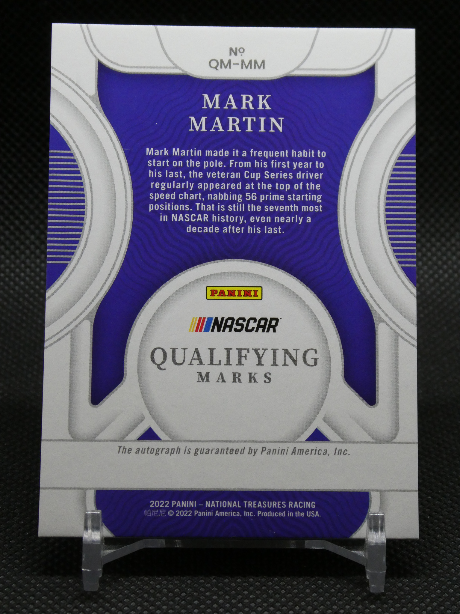 Panini NASCAR qualifying marks trading card featuring Mark Martin, with blue and silver design and Panini/NASCAR logos, text about his career.