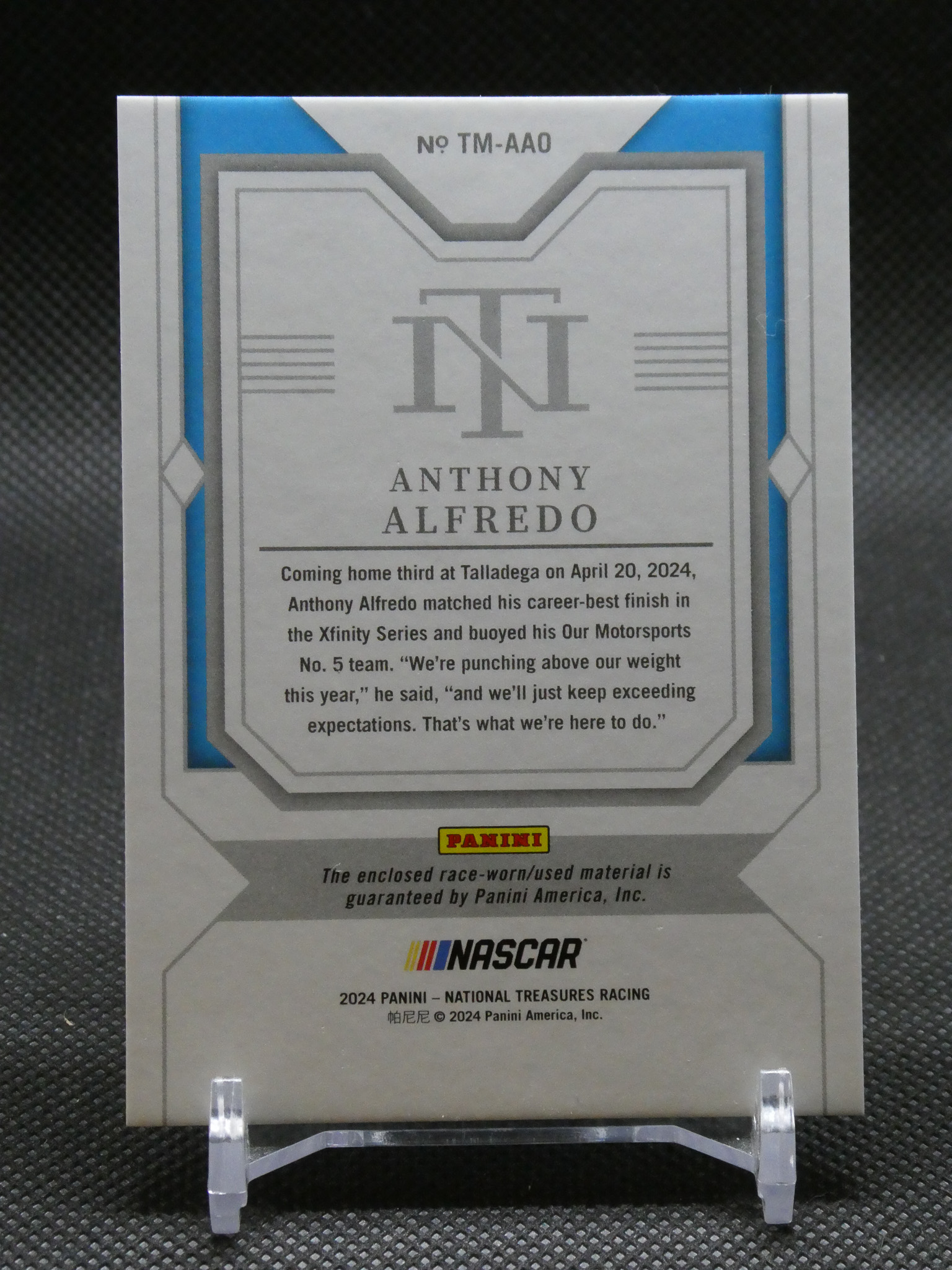 Back of a Panini NASCAR trading card featuring Anthony Alfredo, with blue and silver decorative borders and a bold N-style logo at the top.