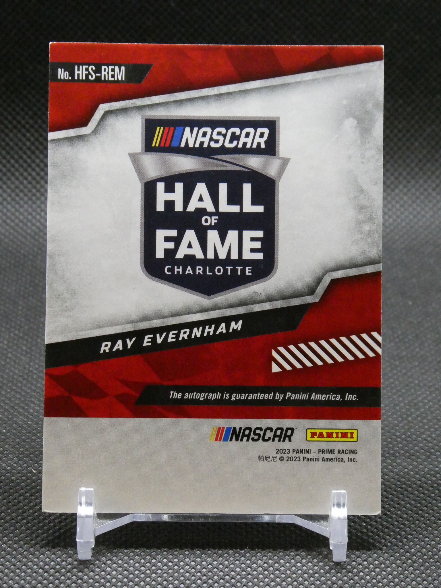 NASCAR Hall of Fame Charlotte card featuring Ray Evernham autograph, Panini 2023 on display.