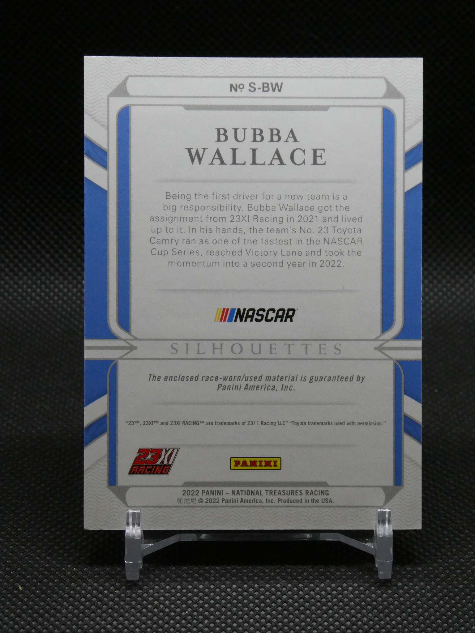 NASCAR Panini silhoutte card featuring Bubba Wallace in blue and white with his biography text and logos at the bottom.