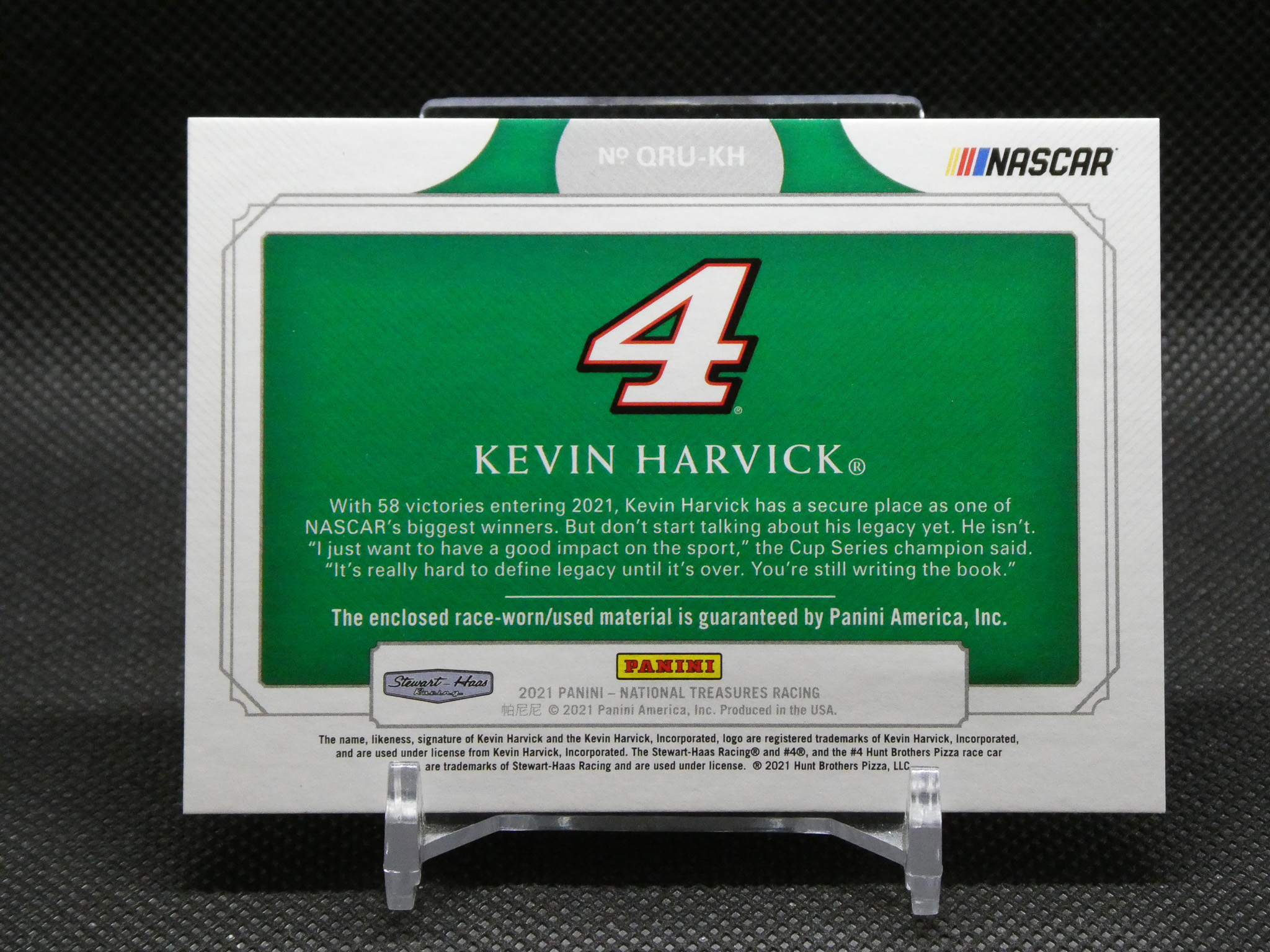 Green Kevin Harvick trading card box with a large white '4' and NASCAR logo at top right, Panini branding visible on bottom edge.