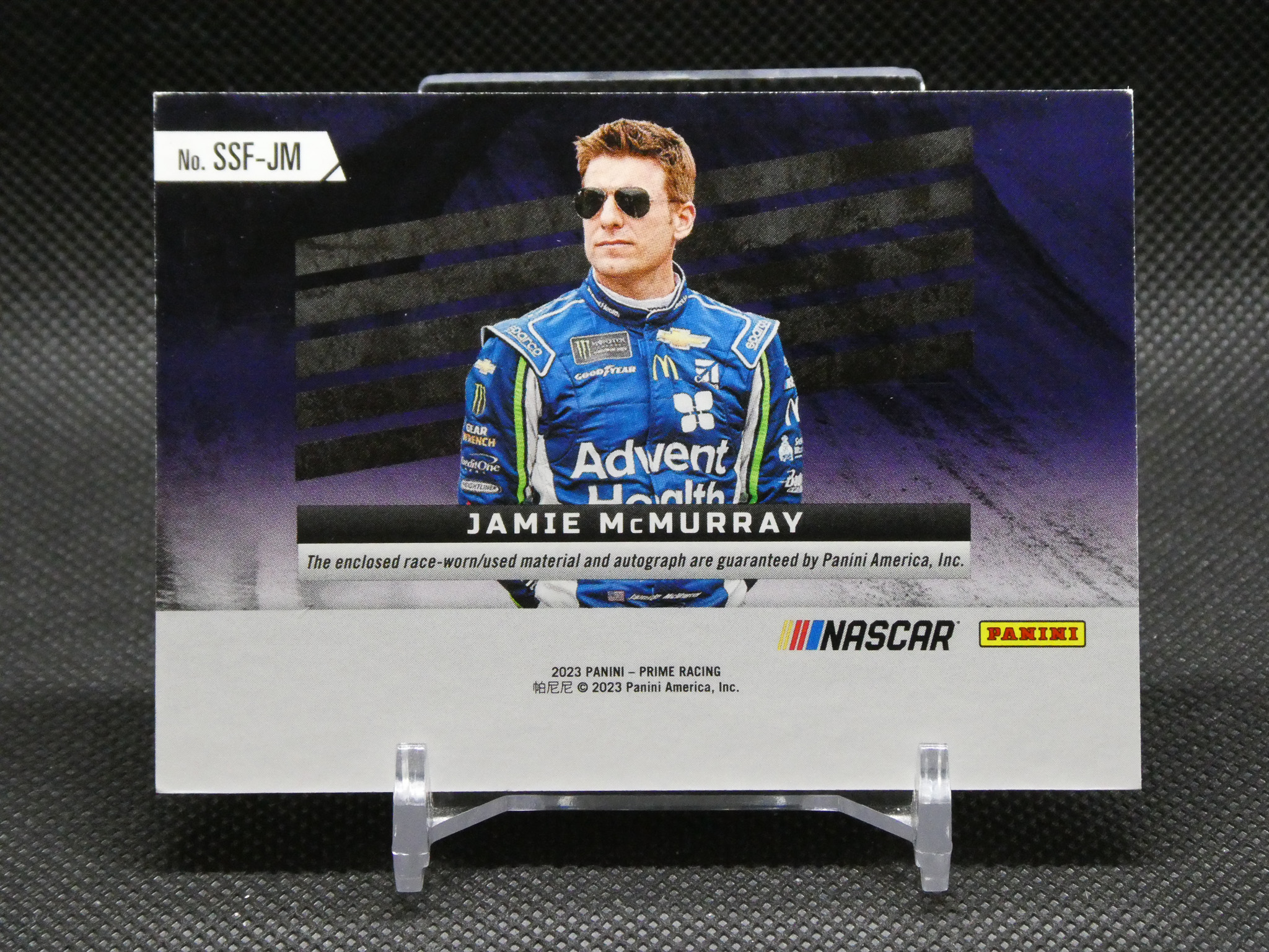 Trading card featuring Jamie McMurray in a blue NASCAR racing suit with Advent Health branding