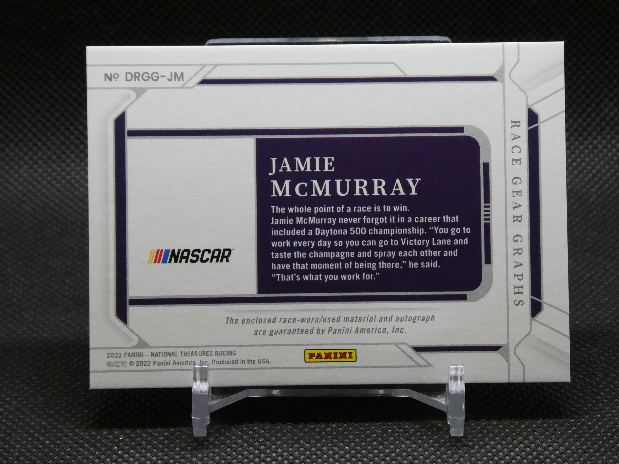 Front of a Panini NASCAR trading card featuring Jamie McMurray's name and a quote, with the NASCAR logo visible.