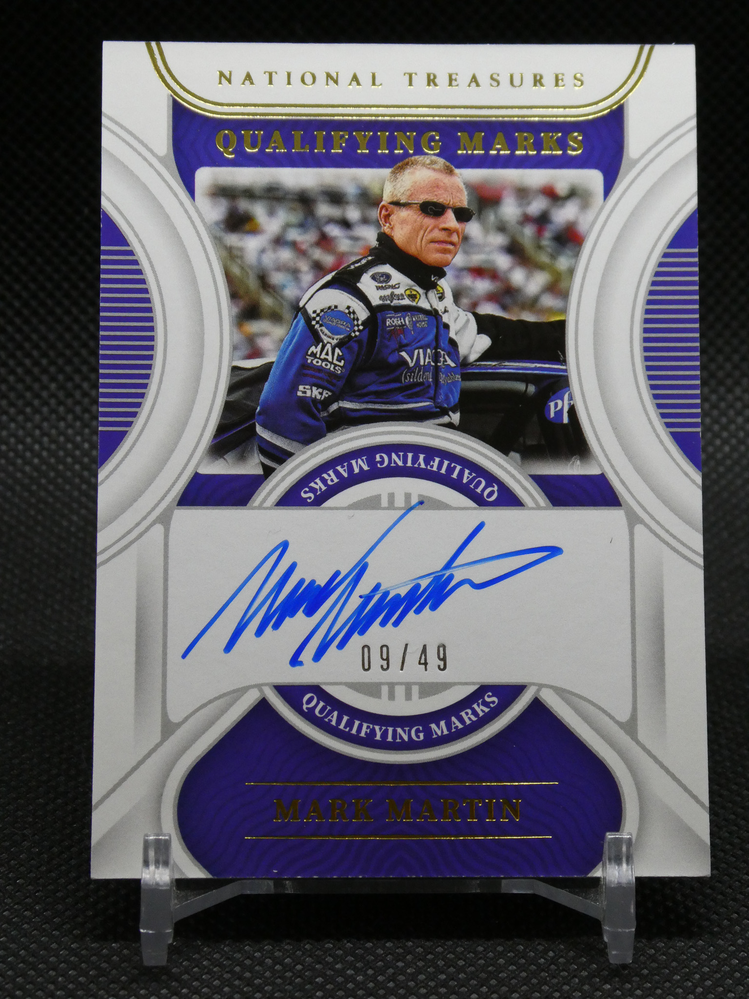 Signed collectible card featuring race car driver Mark Martin in a blue racing suit, with 'Qualifying Marks' design and a blue autograph, 09/49 edition badge.