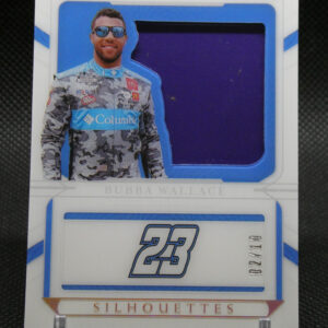 Front of a sports trading card package showing a life-size cutout of a race driver in a camo suit with sunglasses, blue and white design, and 'NATIONAL TREASURES' at the top along with a blue window and the word 'SILHOUETTES' at the bottom.