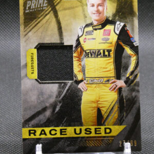 Trading card featuring a race car driver in a yellow DeWALT racing suit, with 'RACE USED' text at the bottom.
