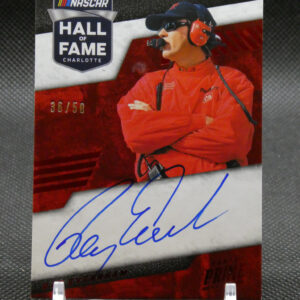 NASCAR Hall of Fame Charlotte card featuring a driver in red gear with headset and an autograph at the bottom.