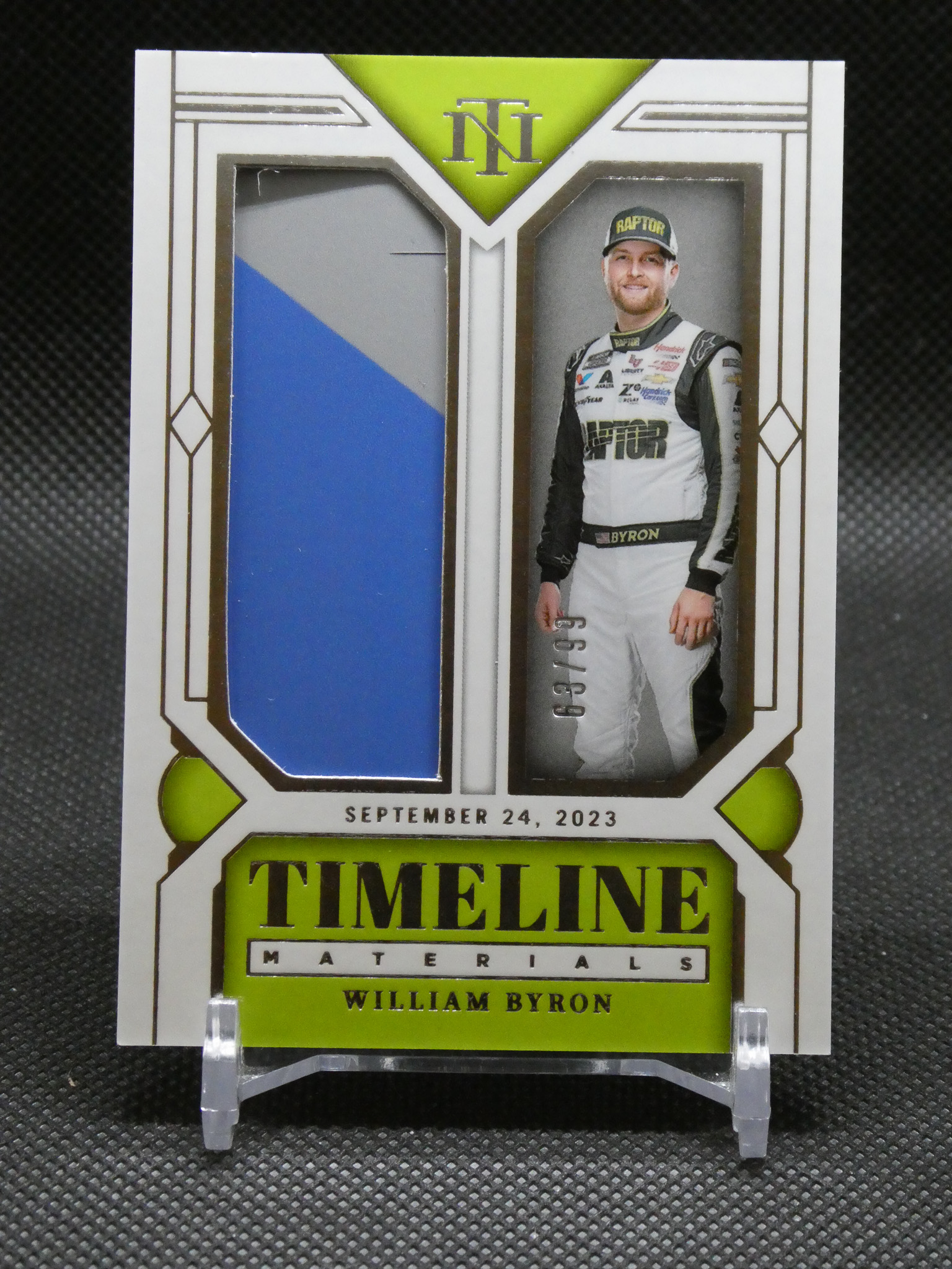 Timelines Materials card featuring William Byron in a racing suit, with blue left panel and neon-green accents.