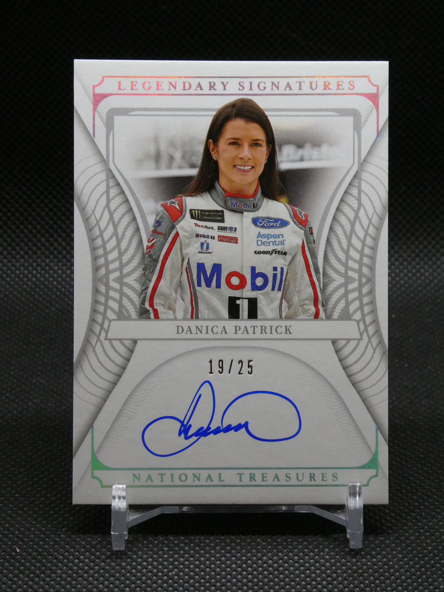 Autographed Danica Patrick trading card with 'Legendary Signatures' and 'National Treasures' branding, featuring her portrait in a racing suit.