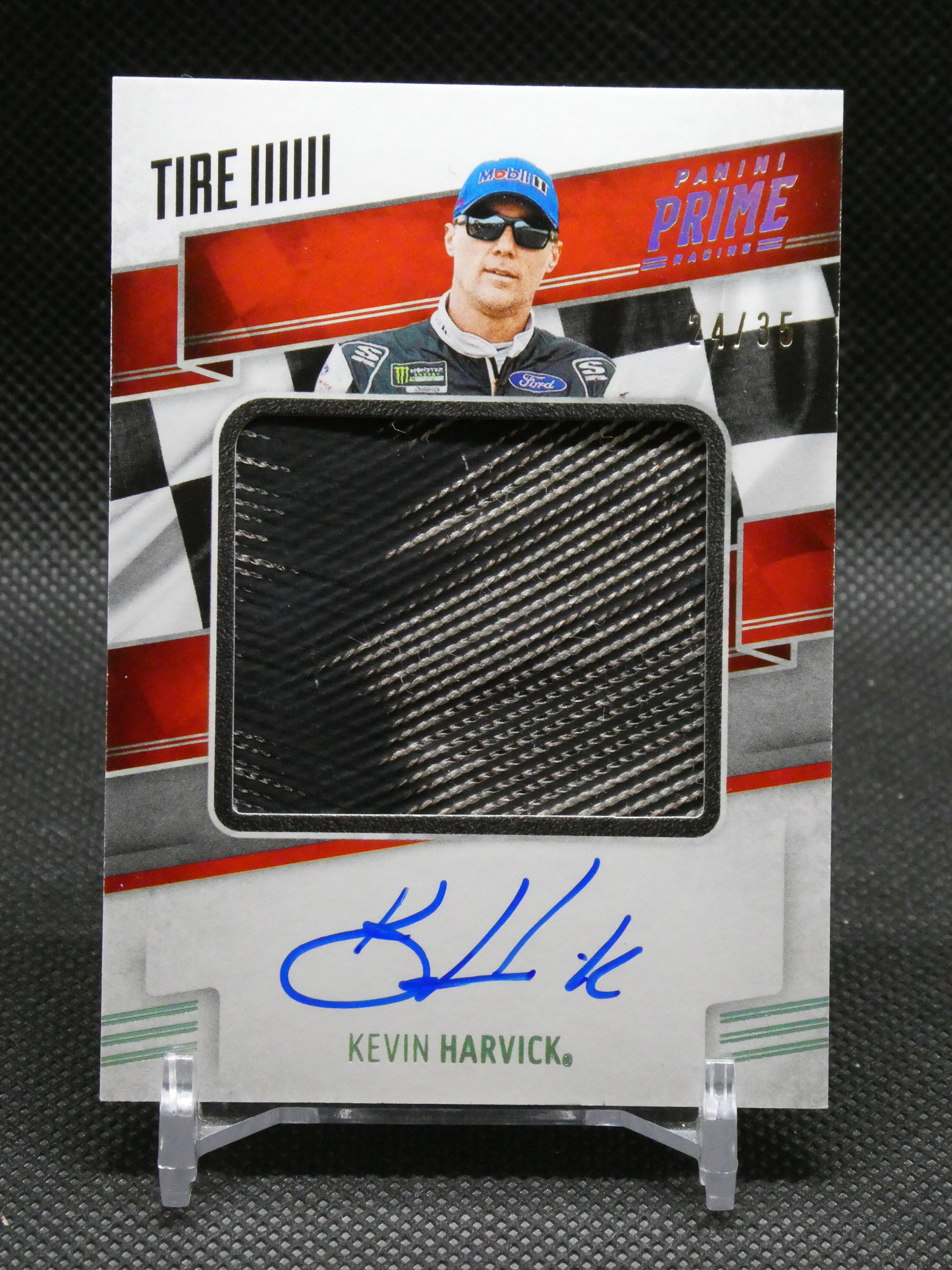Autographed Kevin Harvick trading card featuring his photo and blue signature.