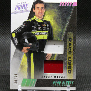 Trading card featuring NASCAR driver Ryan Blaney in a black neon-yellow racing suit with Panini Prime Racing branding and a red insert window.