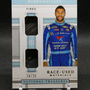 Cardboard display featuring Bubba Wallace in a blue racing suit standing beside a tire display labeled TIRES at the top.