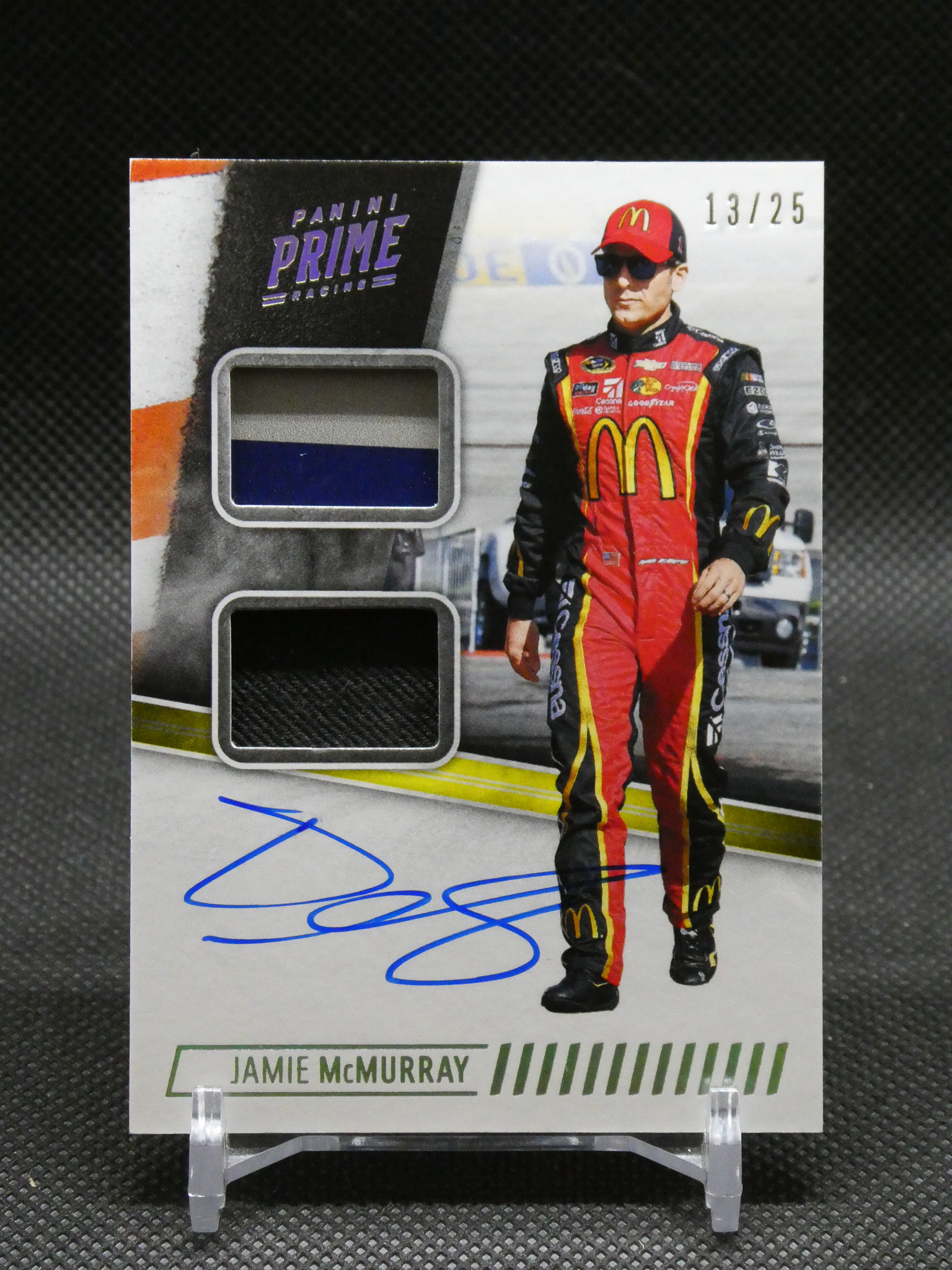 Jamie McMurray autographed Panini Prime Racing trading card, driver in red suit with McDonald's logo.