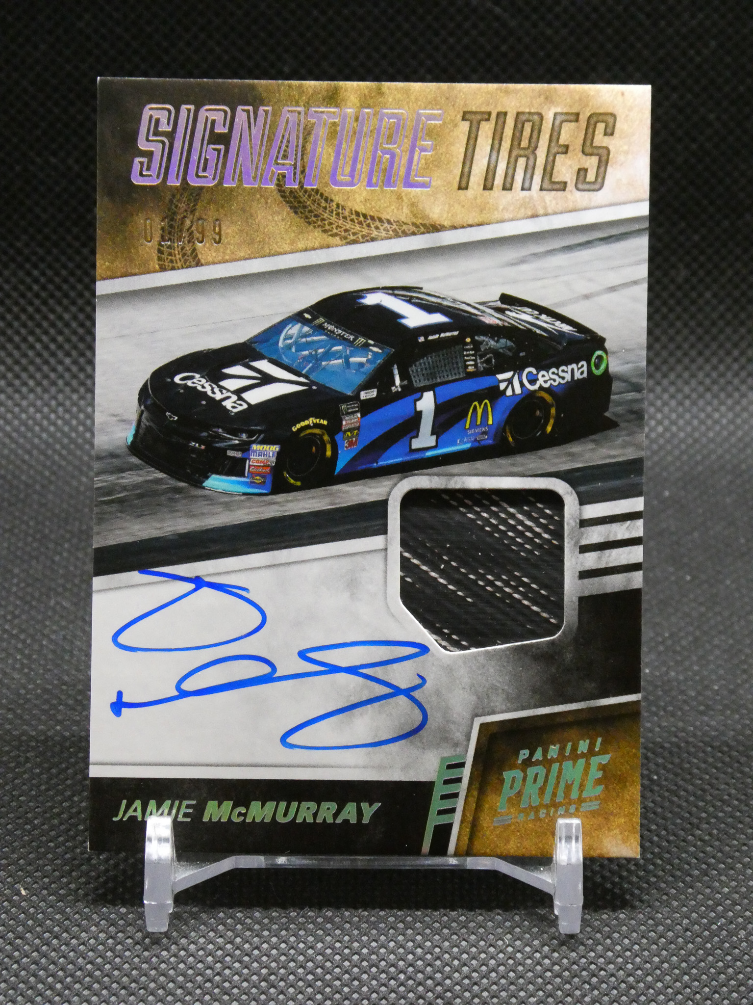 Signed trading card featuring a black-blue race car with number 17 and sponsor logos, incl. Cessna and McDonald's, autographed with blue ink by Jamie McMurray