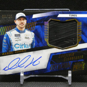 Autographed NASCAR memorabilia card featuring driver Daniel Hemric in a blue racing suit with a blue-gold design and signature across the bottom.