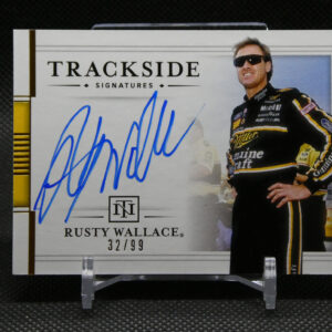 Autographed Rusty Wallace race card from Trackside Signatures, 32/99, with driver in racing suit on the right and blue signature in foreground.