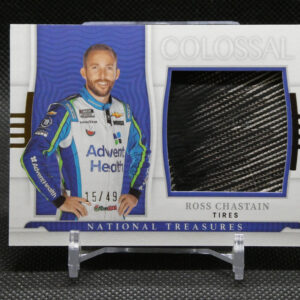 Trading card featuring NASCAR driver Ross Chastain in a blue racing suit, showing 15/49 and National Treasures branding.