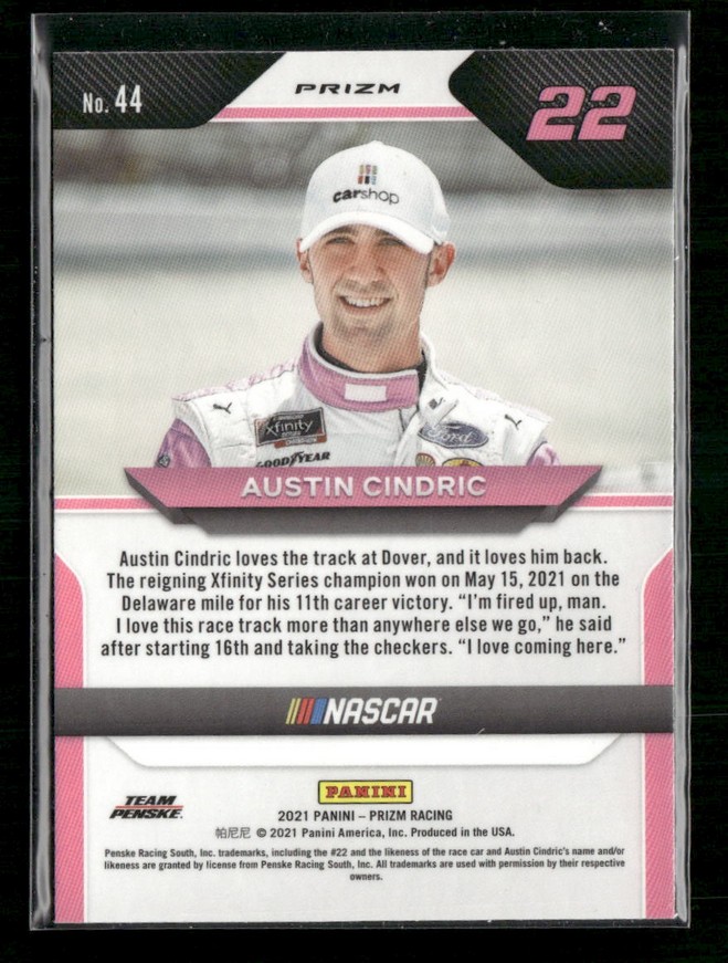 Panini NASCAR trading card featuring Austin Cindric (No.44) with pink accents, cap, and a short bio on the back.