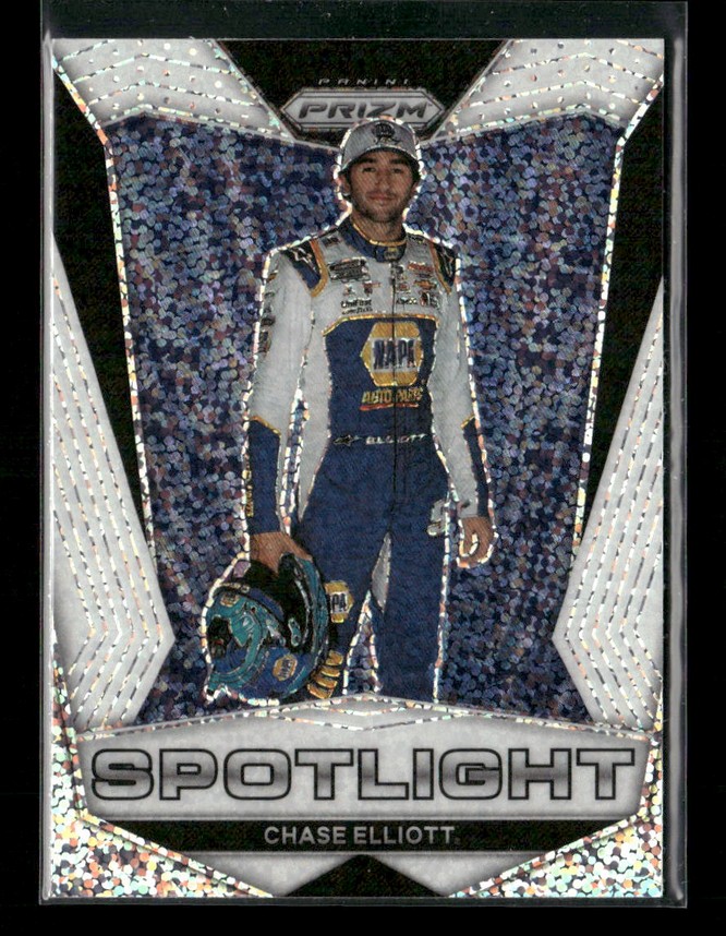 Trading card of a race car driver in a white and blue suit, holding a helmet, with 'SPOTLIGHT' text on a glittery background.
