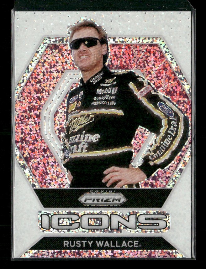 Trading card featuring Rusty Wallace in a black racing suit, posing with hand on hip against a holographic pink background and the name ‘RUSTY WALLACE’ beneath.