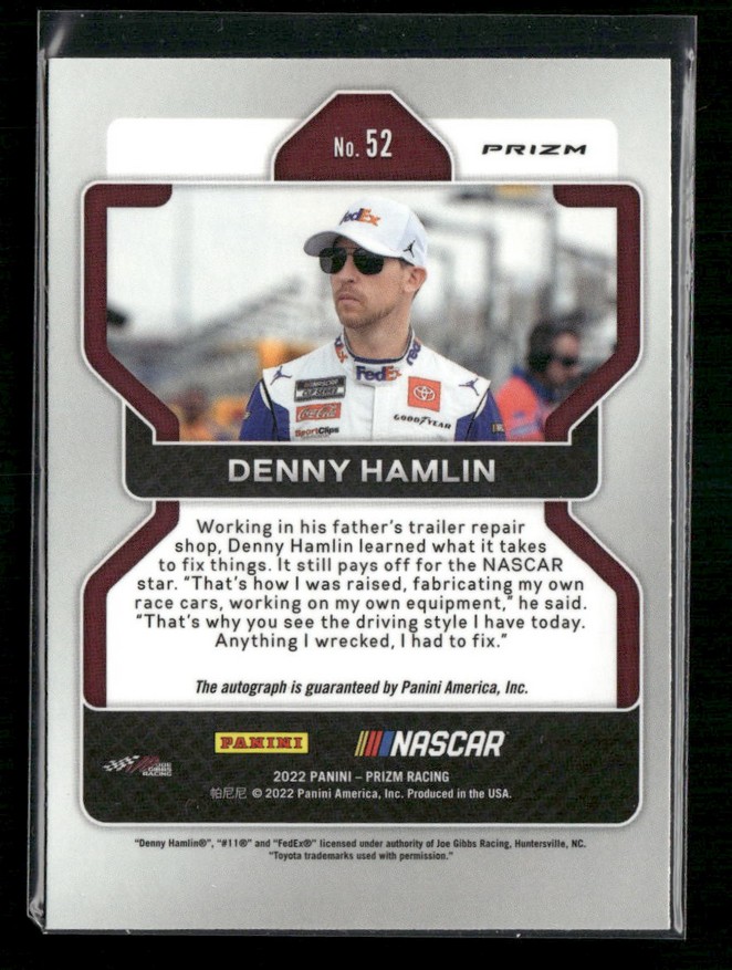 Back of a Panini NASCAR trading card No. 52 featuring Denny Hamlin, photo in a window with bio text and logos below.