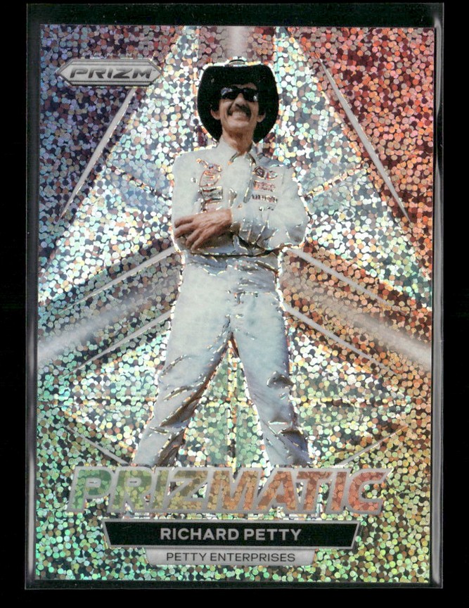 Holographic trading card of Richard Petty standing with arms crossed in a white suit and cowboy hat, Prizm branding visible at top left.