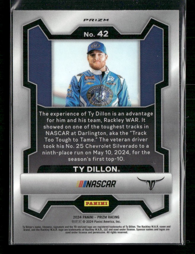 Portrait of Ty Dillon in a blue racing suit on a Panini Prizm NASCAR card No. 42, with NASCAR branding and a bio paragraph.
