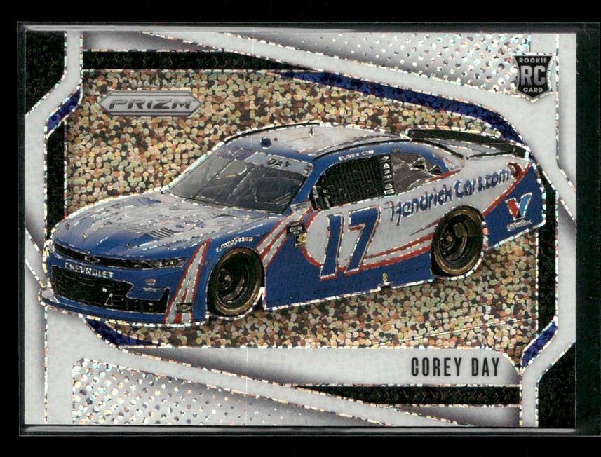 Trading card featuring a blue No. 17 Hendrick Motorsports race car on a speckled background, with 'Corey Day' and 'RC Rookie Card' text.