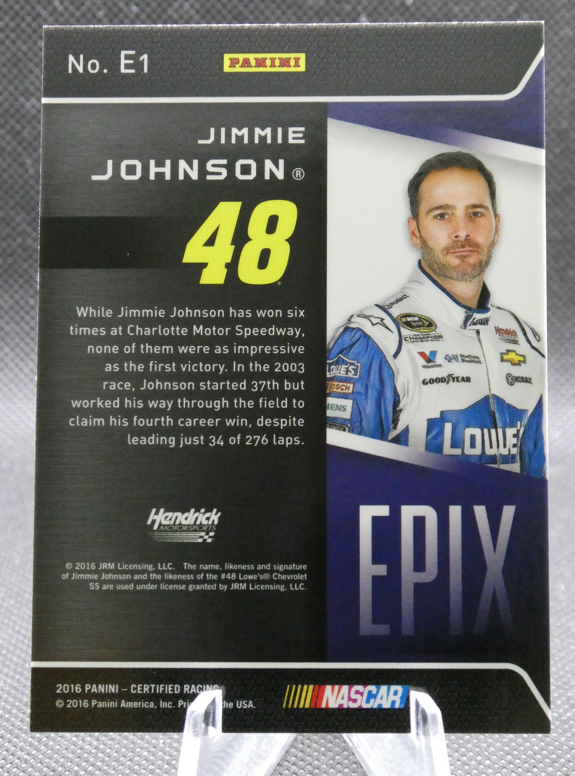 Panini NASCAR trading card featuring Jimmie Johnson #48 with his portrait and a bio paragraph on the left side of the card.