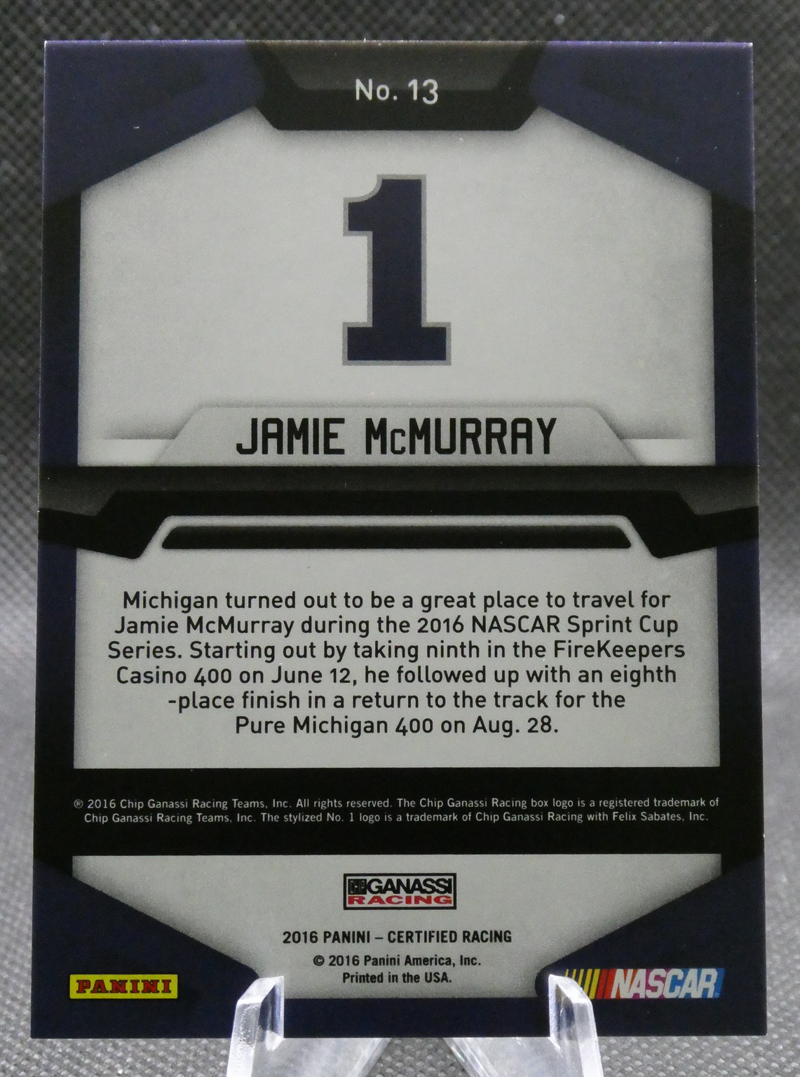 Card showing NASCAR driver Jamie McMurray, No. 13, with a large '1' graphic and descriptive back text about his 2016 season.