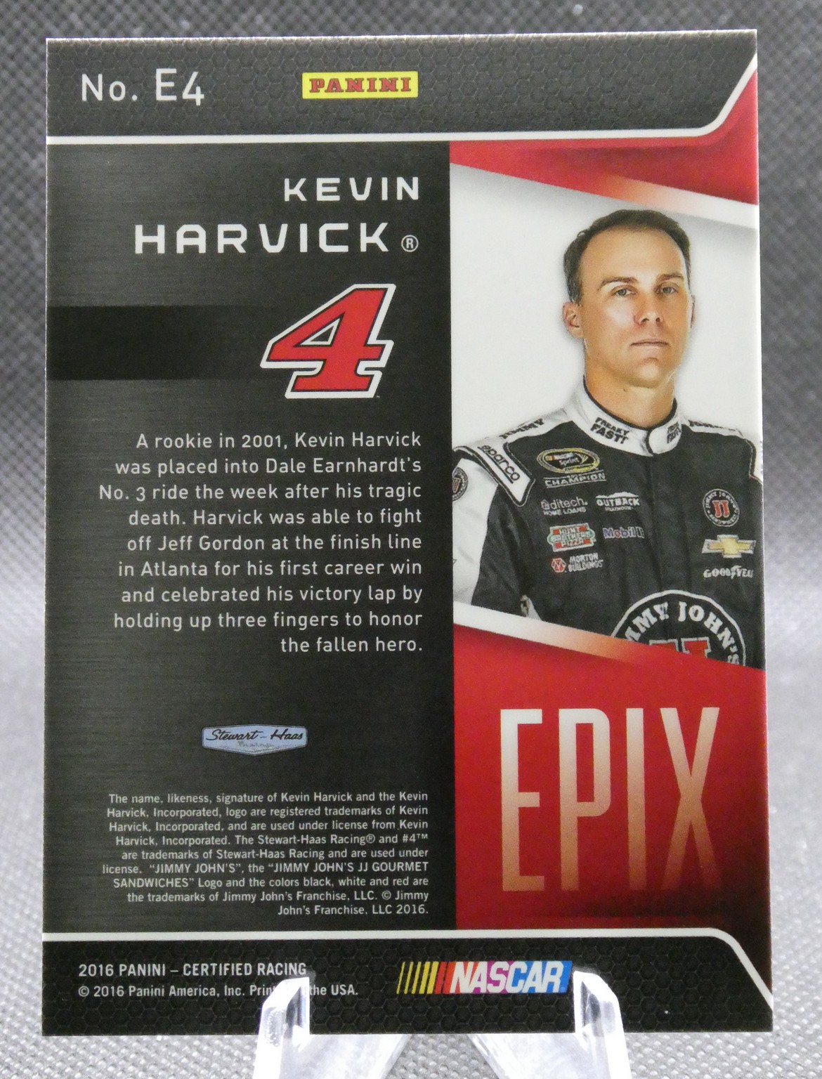 Panini Kevin Harvick trading card, No. E4, with his portrait in a racing suit and a large red 4 logo.