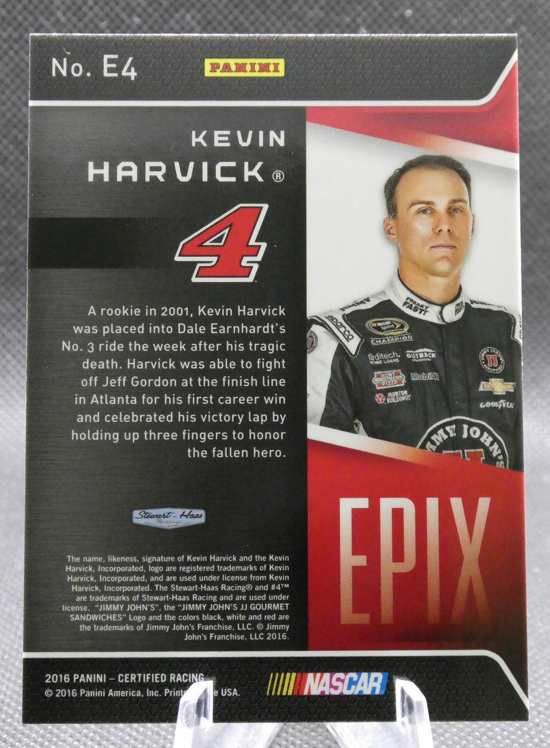 Panini NASCAR trading card for Kevin Harvick, featuring a left text panel and a right portrait in racing suit with the number 4.