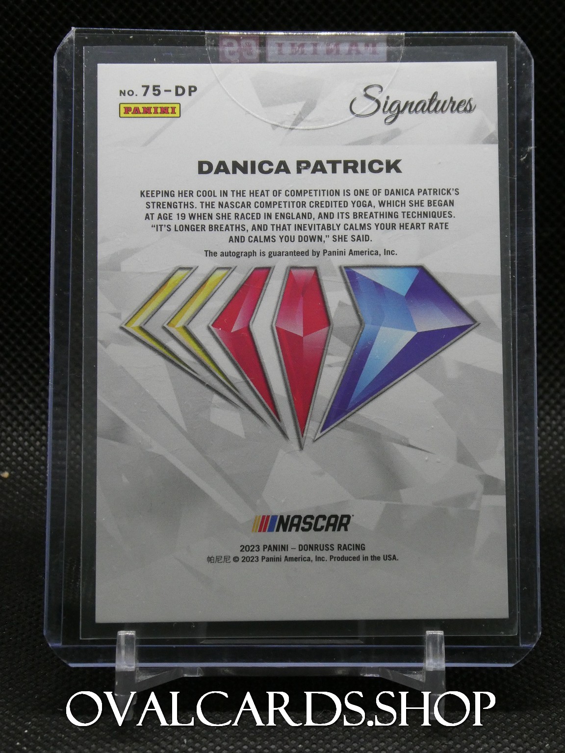 Panini Signatures collectible card featuring Danica Patrick in a clear display case.