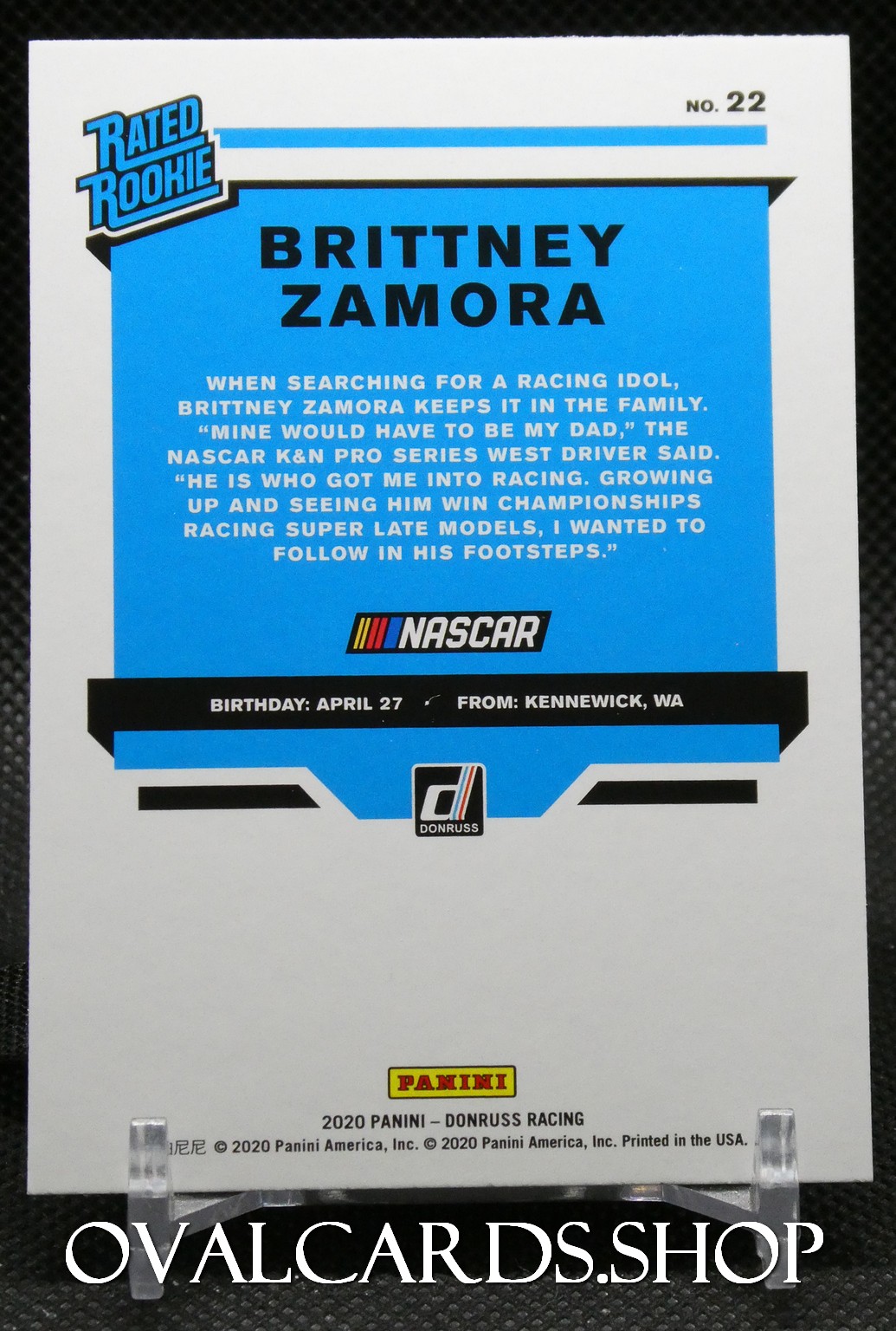 NASCAR trading card for Brittney Zamora with a blue background and 'Rated Rookie' emblem at the top left.
